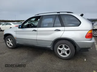2001 BMW X5 3.0i with VIN WBAFA53561LM65536, listed as a Copart auction lot 84695444 with 122,849 mi miles and Salvage Title. Bid and sale history available at carsss.com. Image 2.