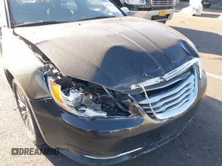 2012 Chrysler 200 Limited with VIN 1C3CCBCG8CN326195, listed as a IAAI auction lot 41439236 with Not Provided miles and . Bid and sale history available at DreamBid. Image 6.