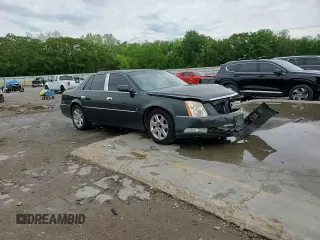 2007 Cadillac DTS V8 z VIN 1G6KD57Y27U179010, wystawiony jako Copart lot #54055605 z przebiegiem 137 326 mil mil oraz Szkoda całkowita • Salvage title. Historia ofert i sprzedaży dostępna na DreamBid. Obrazek 14.