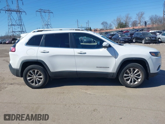 2019 Jeep Cherokee Latitude with VIN 1C4PJMCX7KD146578, listed as a IAAI auction lot 41709586 with 61,134 mi miles. Bid and sale history available at carsss.com. Image 14.
