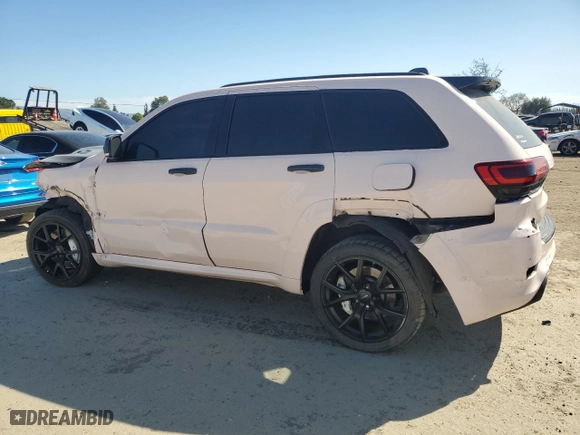 2021 Jeep Grand Cherokee SRT with VIN 1C4RJFDJ7MC798933, listed as a Copart auction lot 46900605 with 59,161 mi miles and Salvage Title. Bid and sale history available at carsss.com. Image 2.