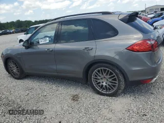 2012 Porsche Cayenne S Hybrid with VIN WP1AE2A24CLA93950, listed as a Copart auction lot 64725885 with Not provided miles and Clean title. Bid and sale history available at DreamBid. Image 2.