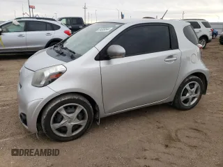 2014 Scion iQ with VIN JTNJJXB04EJ029117, listed as a Copart auction lot 84009544 with 107,803 mi miles and Clean Title. Bid and sale history available at carsss.com. Image 1.