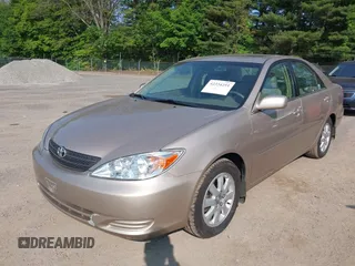 2002 Toyota Camry XLE z VIN 4T1BF30K02U001246, wystawiony jako IAAI lot #42334251 z przebiegiem 58 575 mil mil oraz . Historia ofert i sprzedaży dostępna na DreamBid. Obrazek 6.