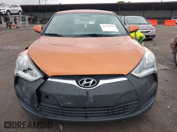 2012 Hyundai Veloster w/Gray Int with VIN KMHTC6AD3CU057620, listed as a IAAI auction lot 42320549 with 113,491 mi miles and . Bid and sale history available at DreamBid. Image 12.