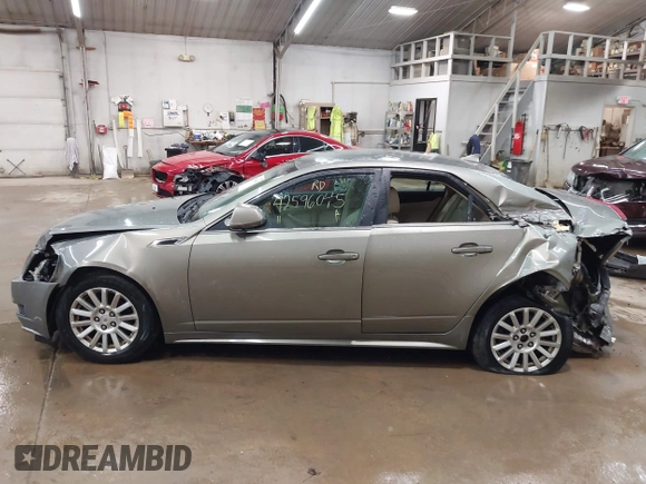 2011 Cadillac CTS Luxury with VIN 1G6DG5EY9B0135220, listed as a IAAI auction lot 42596045 with 158,912 mi miles and . Bid and sale history available at DreamBid. Image 15.