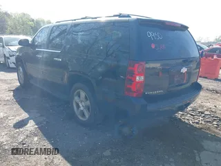 2007 Chevrolet Suburban LT with VIN 1GNFC16077R409950, listed as a IAAI auction lot 41882474 with 266,195 mi miles and . Bid and sale history available at DreamBid. Image 3.