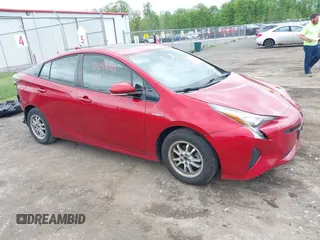 2016 Toyota Prius Four z VIN JTDKARFU5G3502449, wystawiony jako IAAI lot #42259028 z przebiegiem 94 793 mil mil oraz . Historia ofert i sprzedaży dostępna na DreamBid. Obrazek 1.