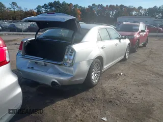 2012 Chrysler 300 with VIN 2C3CCAAG6CH104745, listed as a IAAI auction lot 40708856 with 125,186 mi miles. Bid and sale history available at carsss.com. Image 4.