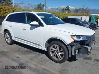2021 Audi Q7 Premium Plus with VIN WA1LXAF73MD021033, listed as a IAAI auction lot 41814415 with 64,377 mi miles and . Bid and sale history available at DreamBid. Image 1.
