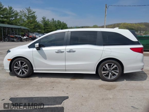 2021 Honda Odyssey Touring with VIN 5FNRL6H80MB010952, listed as a IAAI auction lot 42080412 with 90,594 mi miles and . Bid and sale history available at DreamBid. Image 14.
