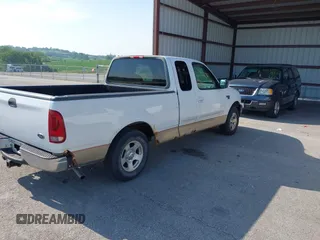 2000 Ford F-150 XL z VIN 1FTRX17W0YNB25467, wystawiony jako IAAI lot #42474329 z przebiegiem Nie podano mil oraz . Historia ofert i sprzedaży dostępna na DreamBid. Obrazek 4.