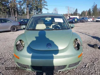 2007 Volkswagen New Beetle Coupe with VIN 3VWRW31C97M519598, listed as a IAAI auction lot 41546315 with 120,216 mi miles. Bid and sale history available at carsss.com. Image 6.
