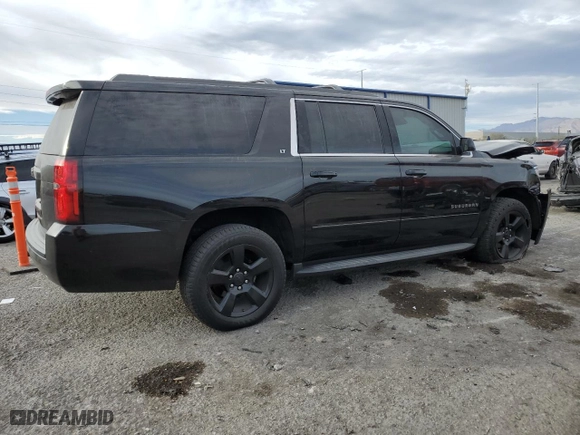 2017 Chevrolet Suburban LT with VIN 1GNSCHKCXHR233937, listed as a Copart auction lot 86526814 with 163,210 mi miles and Salvage Title. Bid and sale history available at carsss.com. Image 3.