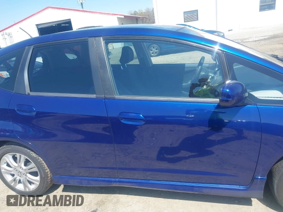 2011 Honda Fit Sport with VIN JHMGE8H59BC005597, listed as a IAAI auction lot 41878417 with 192,156 mi miles and . Bid and sale history available at DreamBid. Image 13.