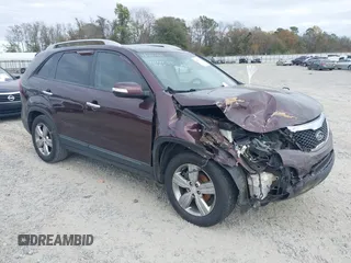 2013 Kia Sorento EX with VIN 5XYKU4A21DG312753, listed as a IAAI auction lot 41033124 with 197,459 mi miles and . Bid and sale history available at carsss.com. Image 1.
