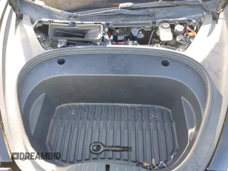 2022 Tesla Model 3 with VIN 5YJ3E1EA9NF295890, listed as a IAAI auction lot 41175917 with 42,230 mi miles and . Bid and sale history available at DreamBid. Image 10.