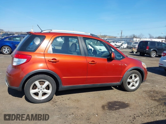 2009 Suzuki SX4 Man Touring Pkg AWD with VIN JS2YB417496201691, listed as a IAAI auction lot 41741746 with 172,369 mi miles. Bid and sale history available at carsss.com. Image 13.