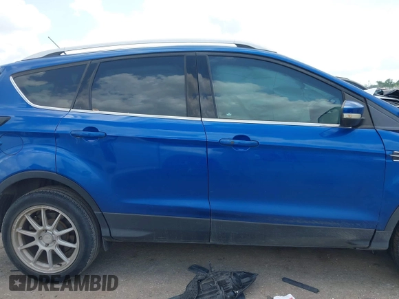 2017 Ford Escape Titanium with VIN 1FMCU0JD3HUE35131, listed as a IAAI auction lot 42062019 with 108,470 mi miles and . Bid and sale history available at DreamBid. Image 14.