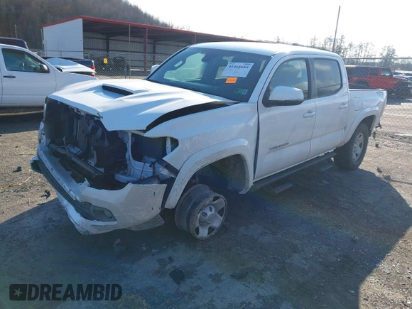 2023 Toyota Tacoma 4WD SR with VIN 3TMCZ5AN1PM538367, listed as a IAAI auction lot 41468684 with 28,879 mi miles. Bid and sale history available at carsss.com. Image 2.