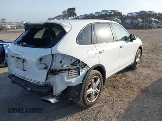 2014 Porsche Cayenne with VIN WP1AA2A23ELA97180, listed as a IAAI auction lot 42072423 with 143,374 mi miles and . Bid and sale history available at DreamBid. Image 4.