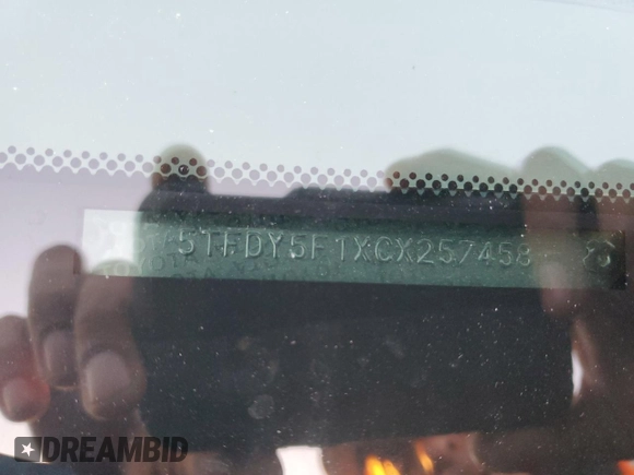 2012 Toyota Tundra 4WD Truck with VIN 5TFDY5F1XCX257458, listed as a Copart auction lot 83660734 with 118,533 mi miles and Salvage Title. Bid and sale history available at carsss.com. Image 13.