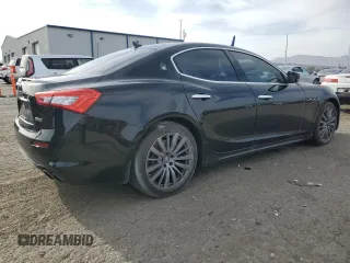2018 Maserati Ghibli S Q4 z VIN ZAM57YTA4J1296684, wystawiony jako Copart lot #51278825 z przebiegiem 59 872 mil mil oraz Szkoda całkowita • Salvage title. Historia ofert i sprzedaży dostępna na DreamBid. Obrazek 3.