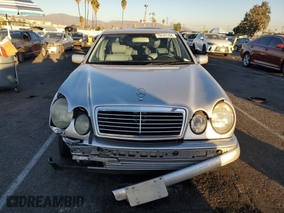 1999 Mercedes-Benz E 320 with VIN WDBJF65H8XA734585, listed as a Copart auction lot 79141194 with 196,908 mi miles and Salvage Title. Bid and sale history available at DreamBid. Image 5.