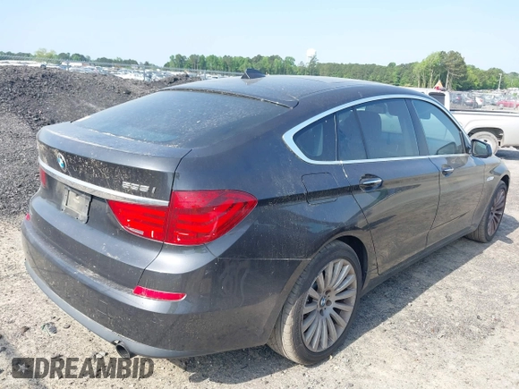 2013 BMW 5 Series GT 535i xDrive with VIN WBASP2C59DC339770, listed as a IAAI auction lot 42171135 with 106,625 mi miles. Bid and sale history available at carsss.com. Image 16.
