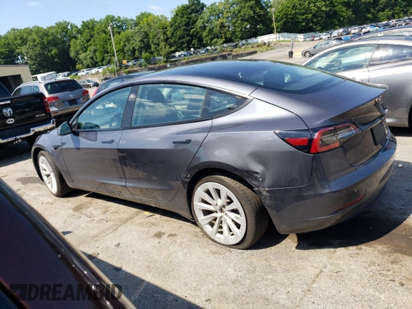 2022 Tesla Model 3 Long Range with VIN 5YJ3E1EB5NF105785, listed as a Copart auction lot 61304654 with 37,306 mi miles and Salvage Title. Bid and sale history available at DreamBid. Image 2.