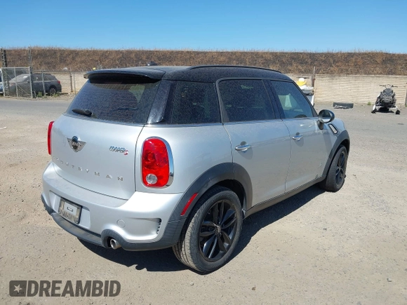 2014 MINI Countryman S with VIN WMWZC5C54EWP40882, listed as a IAAI auction lot 42633141 with 176,641 mi miles and . Bid and sale history available at DreamBid. Image 4.