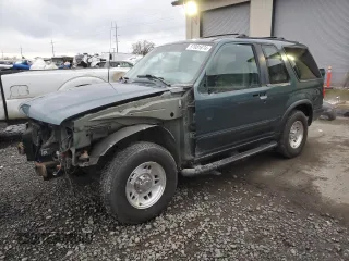 1997 Ford Explorer z VIN 1FMCU24E5VUB71602, wystawiony jako Copart lot #87081674 z przebiegiem 193 534 mil mil oraz Szkoda całkowita • Salvage title. Historia ofert i sprzedaży dostępna na DreamBid. Obrazek 1.