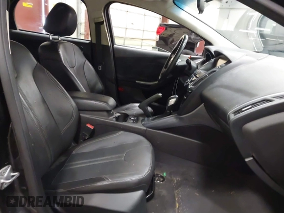 2014 Ford Focus Titanium with VIN 1FADP3J22EL199563, listed as a IAAI auction lot 41450106 with 129,271 mi miles. Bid and sale history available at carsss.com. Image 5.