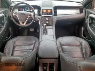 2014 Ford Taurus SEL z VIN 1FAHP2E84EG133955, wystawiony jako Copart lot #56630155 z przebiegiem 113 045 mil mil oraz Szkoda całkowita • Salvage title. Historia ofert i sprzedaży dostępna na DreamBid. Obrazek 8.