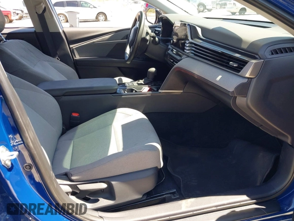 2025 Toyota Camry LE with VIN 4T1DAACK3SU104152, listed as a IAAI auction lot 42039337 with 1,423 mi miles and . Bid and sale history available at DreamBid. Image 5.
