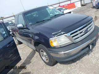 2000 Ford F-150 XL with VIN 1FTRX17W1YKA06683, listed as a IAAI auction lot 42118268 with 1 mi miles. Bid and sale history available at carsss.com. Image 1.