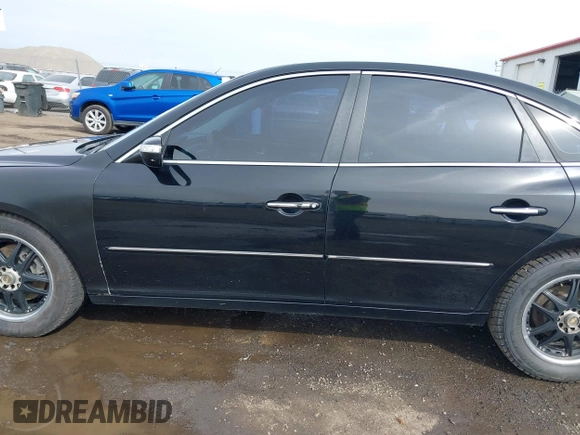 2007 Hyundai Azera SE with VIN KMHFC46F67A186034, listed as a IAAI auction lot 39181735 with 128,930 mi miles. Bid and sale history available at carsss.com. Image 14.