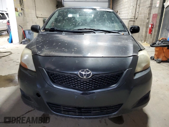 2009 Toyota Yaris z VIN JTDBT903391318992, wystawiony jako Copart lot #58753615 z przebiegiem 286 924 mil mil oraz Tytuł czysty. Historia ofert i sprzedaży dostępna na DreamBid. Obrazek 5.