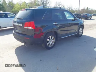 2013 Kia Sorento LX with VIN 5XYKTCA60DG347929, listed as a IAAI auction lot 42144507 with 210,216 mi miles. Bid and sale history available at carsss.com. Image 4.