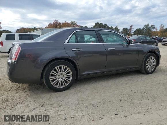 2014 Chrysler 300 C with VIN 2C3CCAKT6EH109281, listed as a Copart auction lot 79534984 with 183,148 mi miles and Salvage Title. Bid and sale history available at DreamBid. Image 3.
