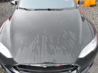 2014 Tesla Model S 60 with VIN 5YJSA1H18EFP28053, listed as a IAAI auction lot 41191521 with 82,207 mi miles and . Bid and sale history available at DreamBid. Image 10.