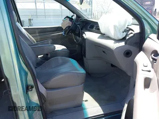 1998 Ford Windstar GL with VIN 2FMDA5140WBB42090, listed as a IAAI auction lot 41973304 with 68,809 mi miles and . Bid and sale history available at carsss.com. Image 5.