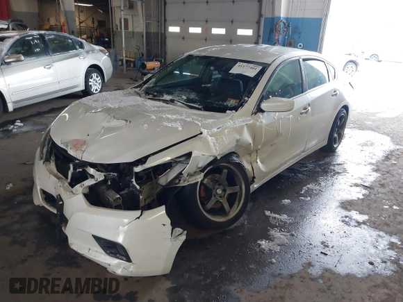 2016 Nissan Altima SR with VIN 1N4AL3AP1GC174425, listed as a IAAI auction lot 41177401 with 173,374 mi miles and . Bid and sale history available at DreamBid. Image 2.