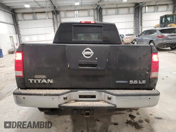 2010 Nissan Titan LE with VIN 1N6BA0EC1AN320311, listed as a Copart auction lot 85157484 with 234,050 mi miles and Salvage Title. Bid and sale history available at carsss.com. Image 6.