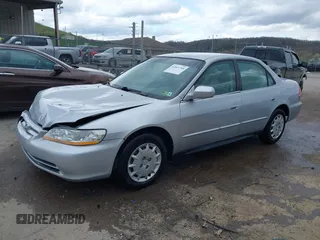 2001 Honda Accord LX z VIN 1HGCG56491A098359, wystawiony jako IAAI lot #42021768 z przebiegiem 122 121 mil mil oraz . Historia ofert i sprzedaży dostępna na DreamBid. Obrazek 17.