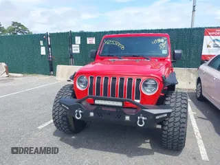 2021 Jeep Wrangler Unlimited Sahara z VIN 1C4HJXEGXMW631033, wystawiony jako IAAI lot #42550070 z przebiegiem 54 429 mil mil oraz . Historia ofert i sprzedaży dostępna na DreamBid. Obrazek 12.