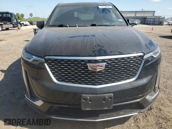 2021 Cadillac XT6 Premium Luxury with VIN 1GYKPCRS4MZ199110, listed as a Copart auction lot 51798905 with 66,486 mi miles and Salvage Title. Bid and sale history available at DreamBid. Image 5.