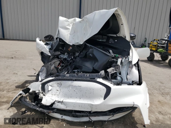 2023 Ford Mustang Mach-E Select with VIN 3FMTK1SS5PMA14734, listed as a Copart auction lot 59740115 with Not provided miles and Salvage title. Bid and sale history available at DreamBid. Image 5.