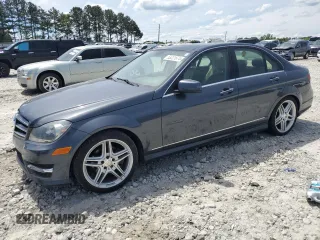 2014 Mercedes-Benz C-Class C 250 Sport with VIN WDDGF4HB8EA955632, listed as a Copart auction lot 53221674 with 153,924 mi miles and Salvage Title. Bid and sale history available at carsss.com. Image 1.