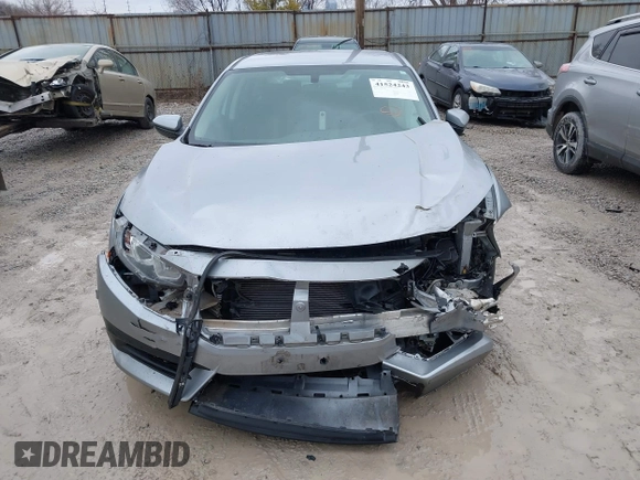 2017 Honda Civic LX z VIN 2HGFC2F51HH562496, wystawiony jako IAAI lot #41524243 z przebiegiem Nie podano mil oraz . Historia ofert i sprzedaży dostępna na DreamBid. Obrazek 11.